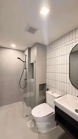 Modern bathroom with sleek design and glass shower enclosure