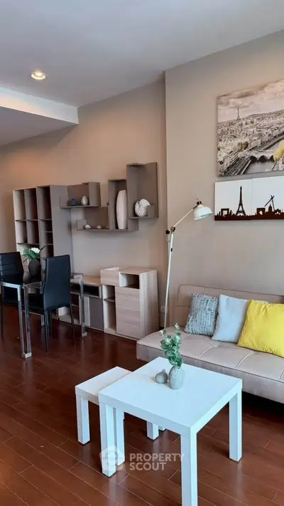 Modern living room with stylish decor and wooden flooring