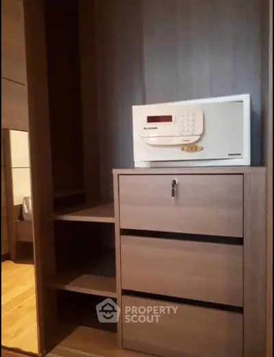 Secure storage space with built-in safe in modern apartment