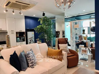Modern living room with stylish decor and open layout in a contemporary apartment.