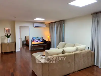 Spacious living room with cozy sofa and modern decor