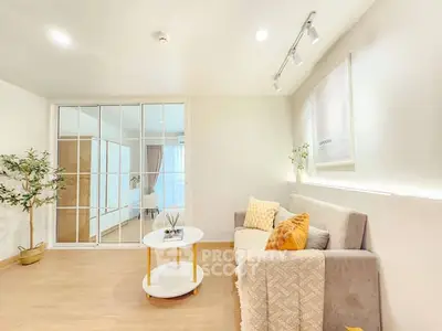 Bright and modern living room with cozy sofa and stylish decor