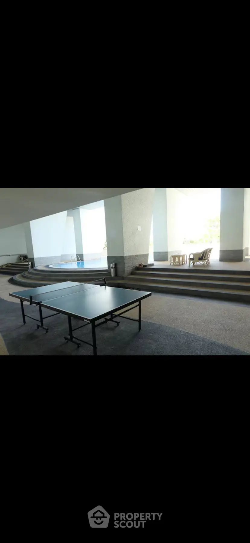 Modern indoor recreational area with ping pong table and pool, perfect for leisure and relaxation.