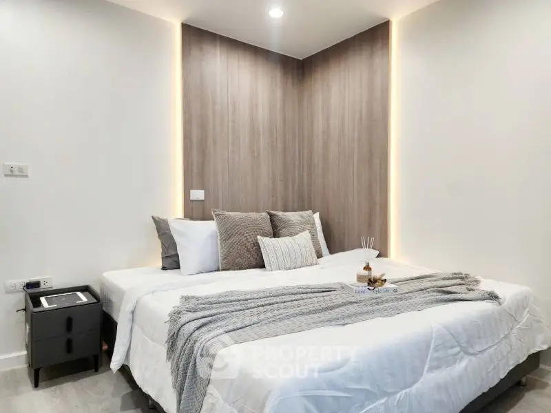 Modern bedroom with cozy lighting and stylish decor