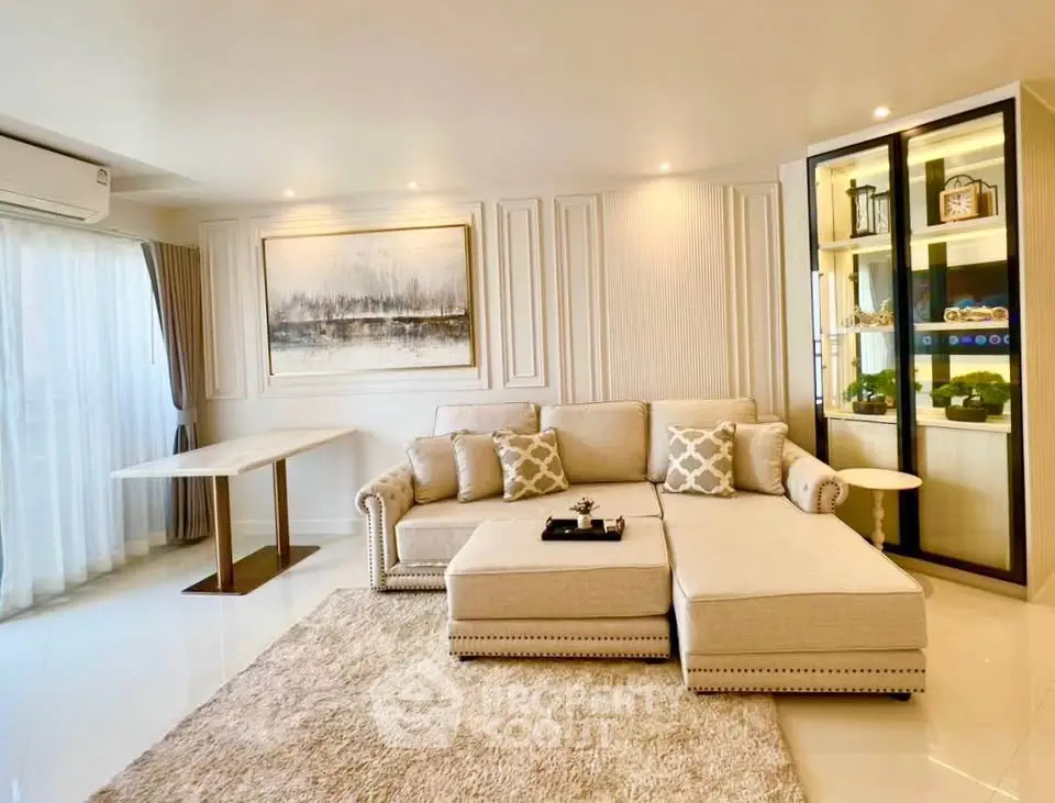 Luxurious living room with elegant decor and plush seating in modern apartment