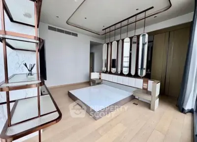 Modern minimalist living room with unique mirror design and wooden flooring