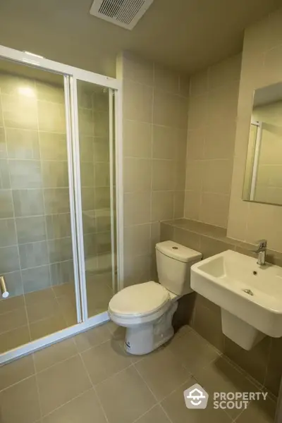 Modern bathroom with sleek shower and contemporary fixtures