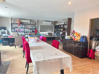 Spacious living room with elegant dining area and modern decor