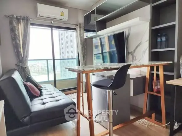 Modern living room with balcony view and stylish furniture