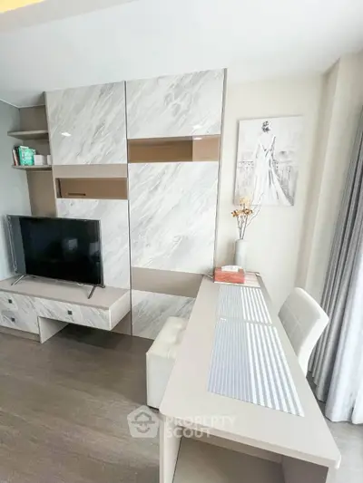 Modern living room with stylish TV unit and elegant decor