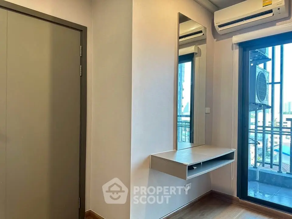 Modern apartment corner with air conditioning and balcony view