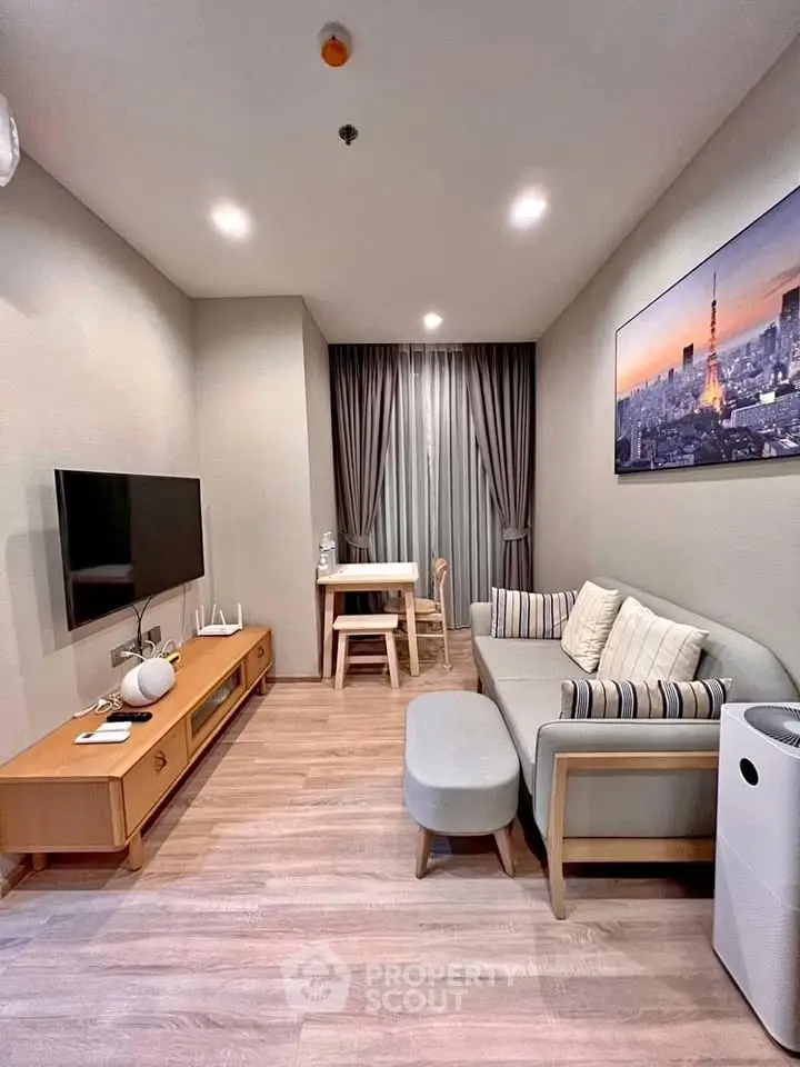 Modern living room with stylish decor and cozy seating area.