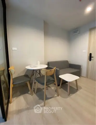 Cozy living room with modern furniture and wooden flooring