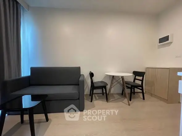 Modern living room with sleek furniture and minimalist design