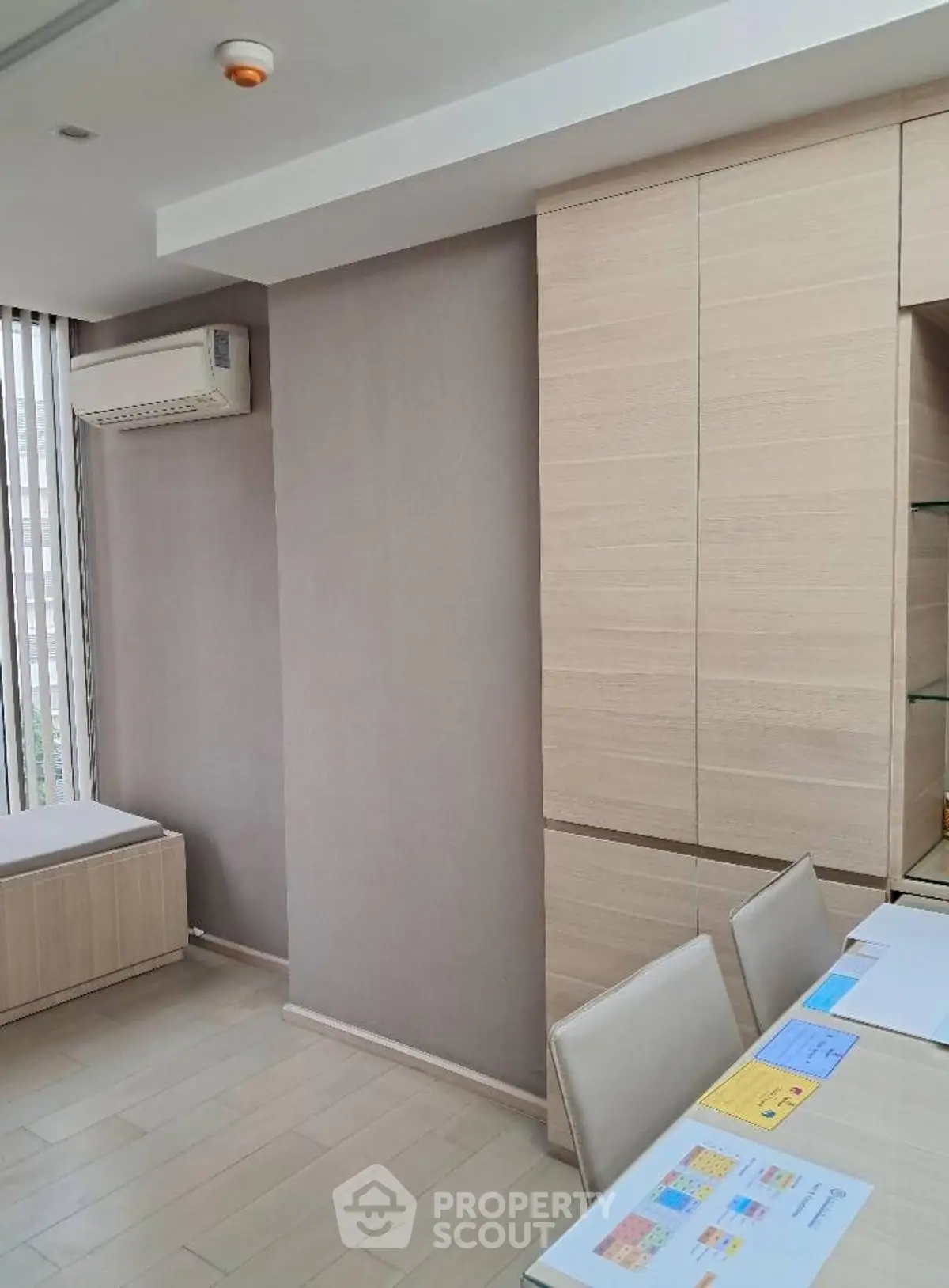 Modern study room with sleek cabinetry and natural light