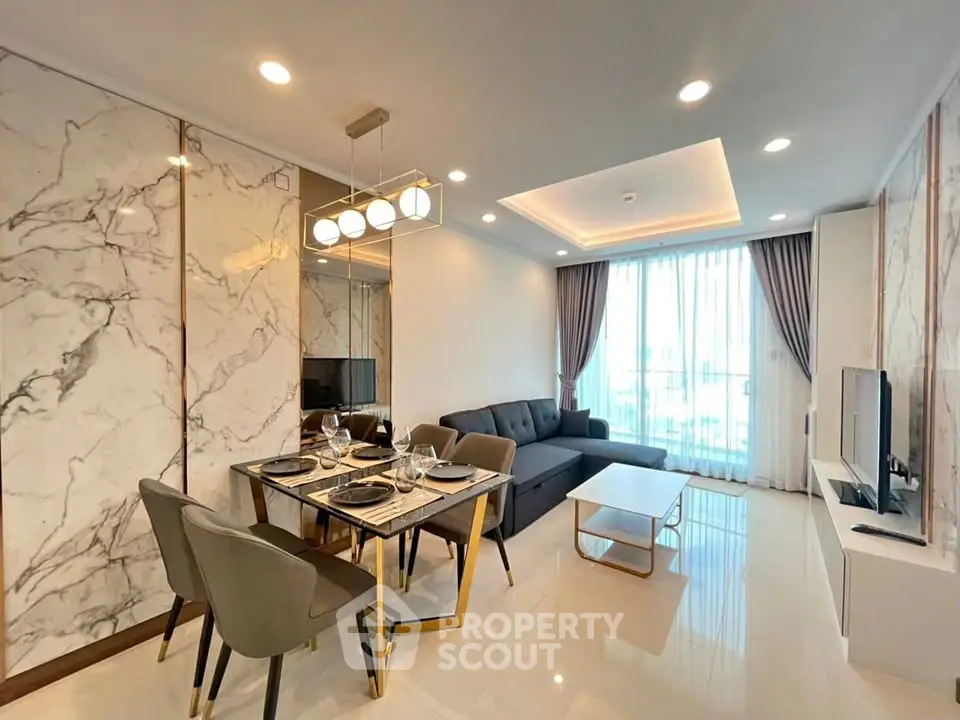 Luxurious modern living room with elegant marble accents and stylish furniture, perfect for sophisticated urban living.