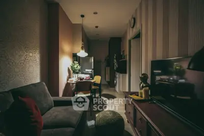 Cozy living room with modern decor and ambient lighting, perfect for relaxation.