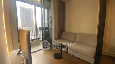 Modern living room with balcony view in high-rise apartment