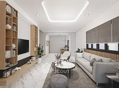 Modern living room with sleek design, marble flooring, and stylish furniture.