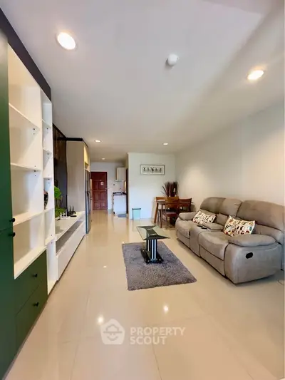 Modern living room with cozy seating and sleek decor