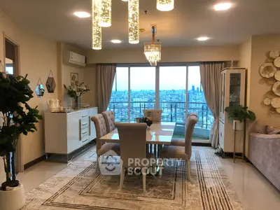 Luxurious living room with elegant dining area and stunning city view from balcony.