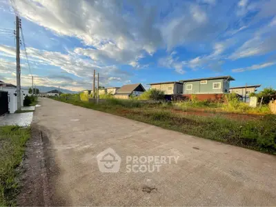 Scenic view of residential area with modern houses and clear blue sky