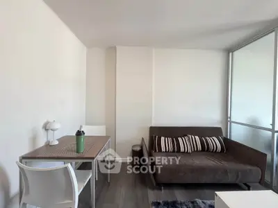 Modern living room with sleek furniture and natural light