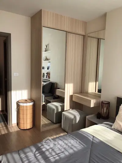 Modern bedroom with stylish wooden furniture and natural light