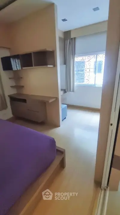 Cozy bedroom with study nook and natural light