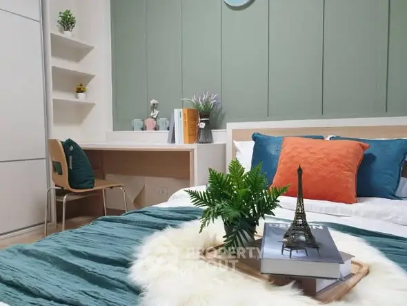 Stylish bedroom with modern decor, cozy bed, and elegant study area, perfect for relaxation and productivity.