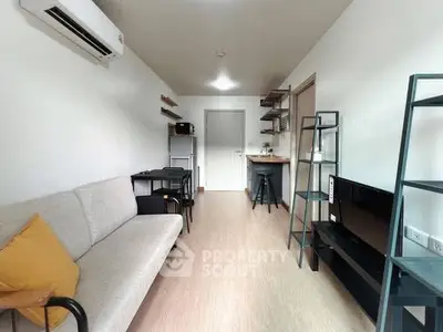 Modern living room with minimalist decor and cozy seating area