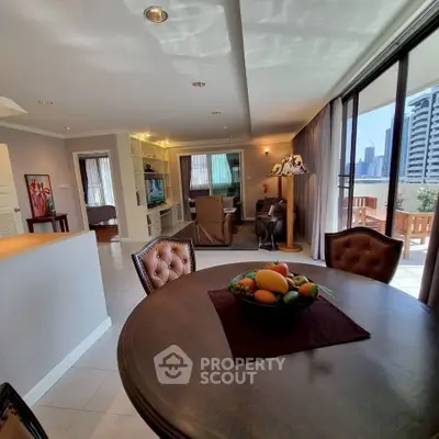 Spacious living room with city view and elegant dining area in modern apartment