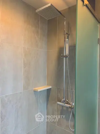 Modern bathroom with sleek shower design and frosted glass door