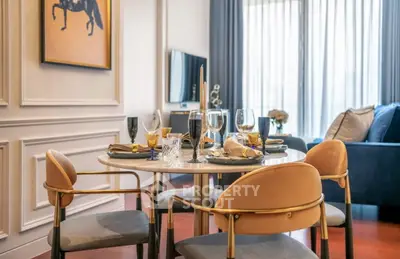 Elegant dining area with stylish decor and modern furniture in a luxurious living space.