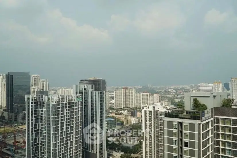 Stunning cityscape view showcasing modern high-rise buildings under a clear sky.