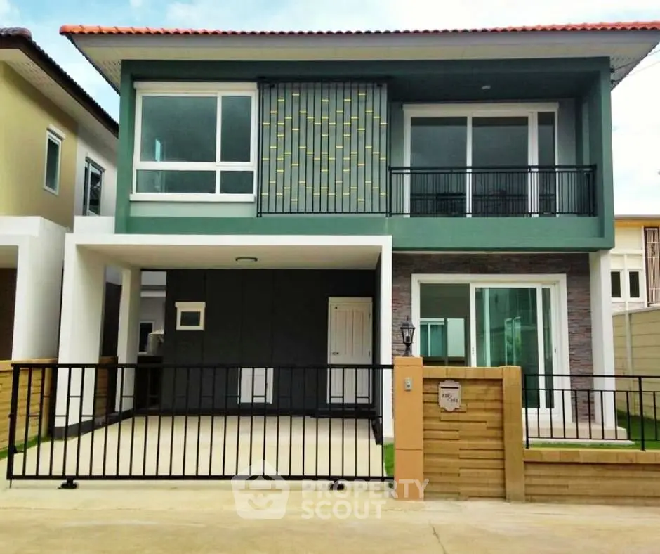 Modern two-story house with spacious driveway and stylish facade