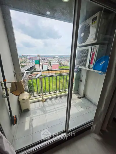 Charming balcony with city view, perfect for relaxation and enjoying the skyline.
