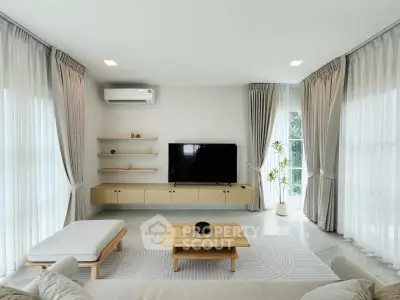 Spacious modern living room with elegant decor and natural light