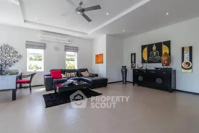 Spacious modern living room with stylish decor and natural light