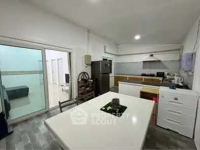 Spacious kitchen with modern appliances and open layout in a contemporary home.