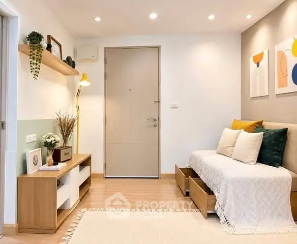 Charming living room with modern decor, cozy seating, and stylish lighting, perfect for relaxation and entertaining.