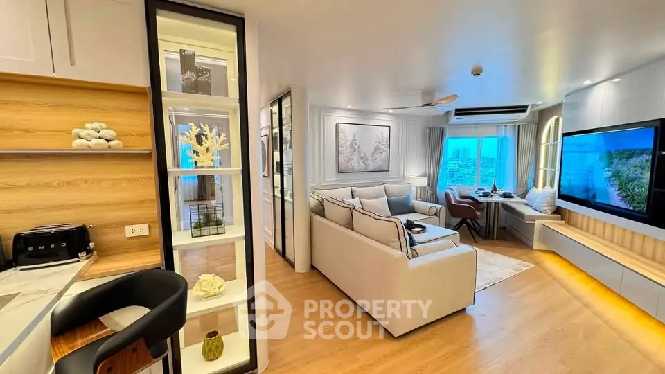 Luxurious modern living room with open kitchen and stunning city view
