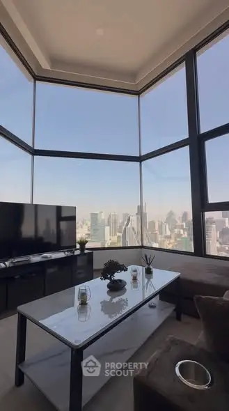 Luxurious living room with panoramic city view and modern decor