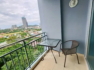 Charming balcony with city view, perfect for relaxation and enjoying the skyline.