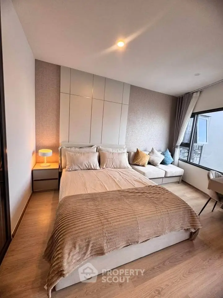 Modern bedroom with cozy bed and stylish decor in a bright apartment