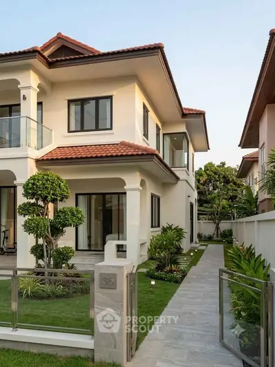 Luxurious modern villa with manicured garden and elegant architecture in a serene neighborhood.