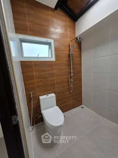 Modern bathroom with sleek design and rainfall showerhead