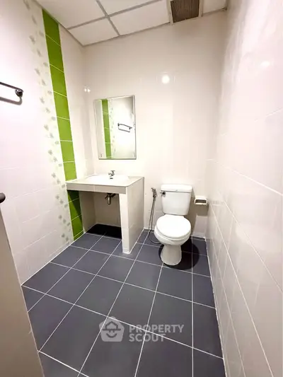 Modern bathroom with sleek tiles and minimalist design