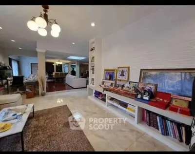 Spacious living room with elegant decor and ample natural light