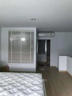 Spacious bedroom with modern design and natural light